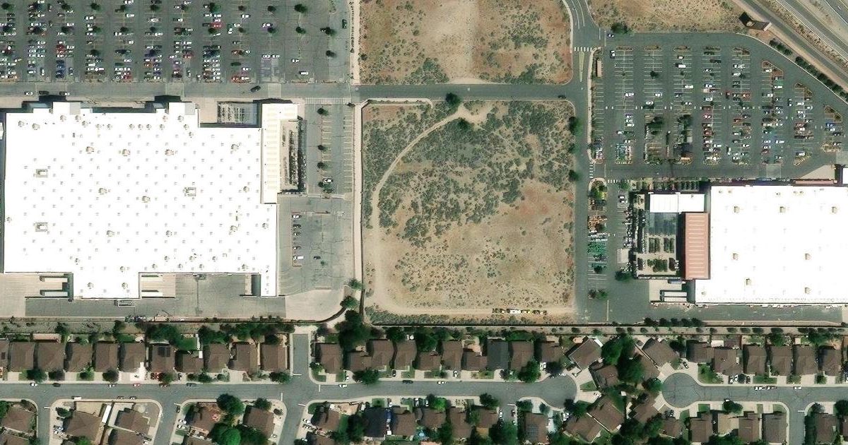 Aerial view of Planet Fitness and its surroundings