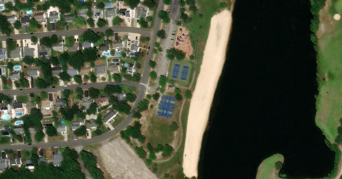 Aerial view of Ocean Acres Golf Course and its surroundings